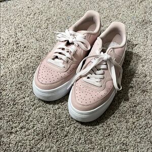 Nike Pink and White Casual Sneakers with Minimalist Design